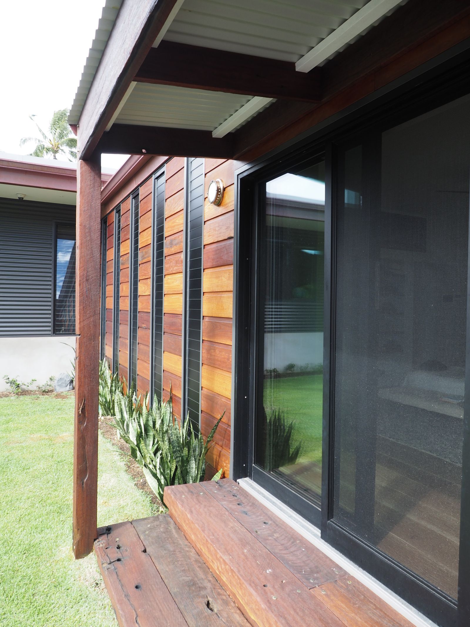 Timber deck with inset glass skylight panel